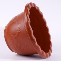 أحد الأمثلة على ذلك هو وعاء الزهور A-61 المصنوع من الحديد الأحمر الدائري.