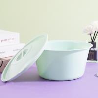 A ceramic-look covered teacup