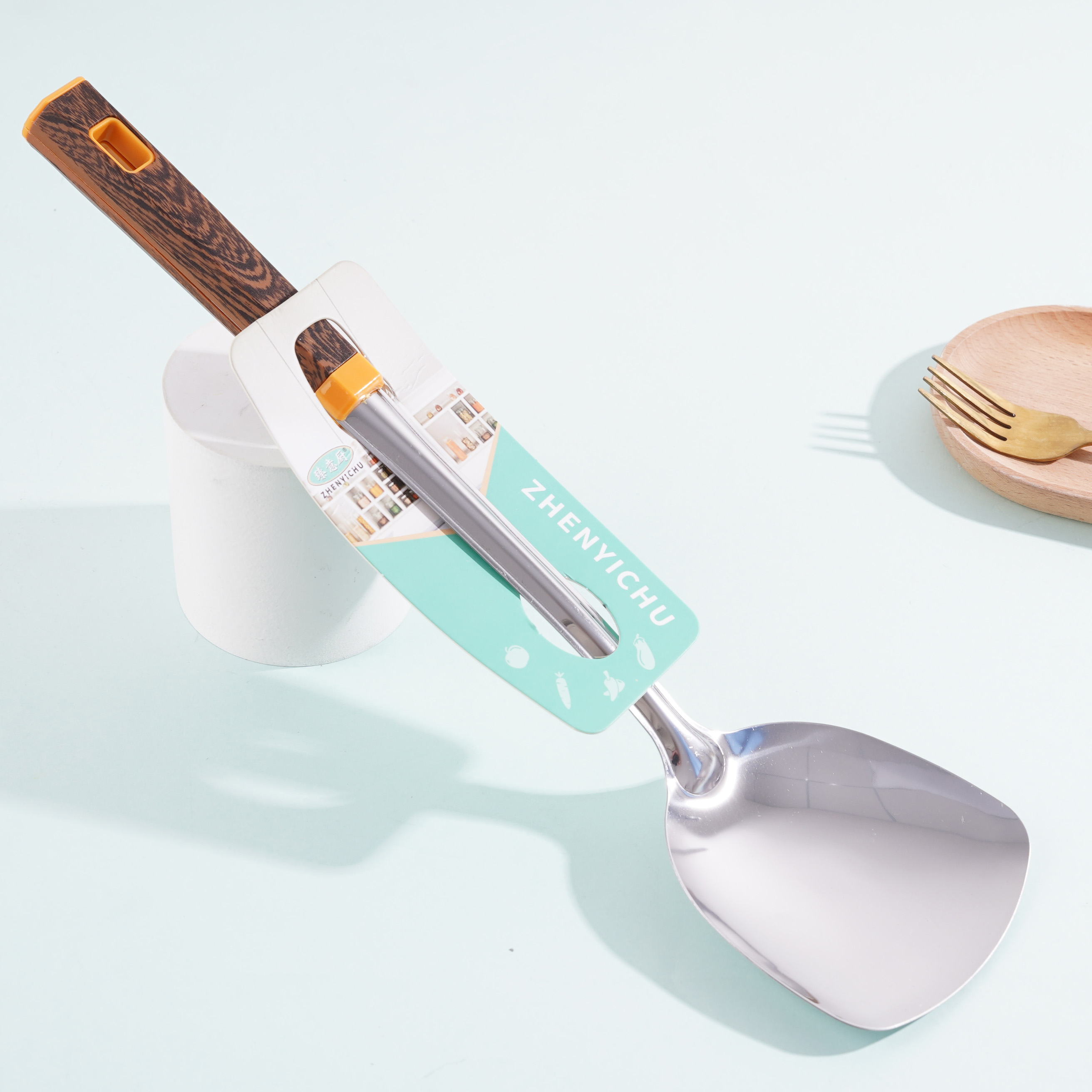 08 مجرفة راضية مزخرفة بنمط الخشب.