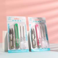 مجموعة من ثلاث قطع تتضمن سكين استخراج ورق التغليف LC1103.