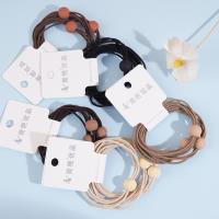 3 pieces of dried shrimp, ground into powder, with bead-headed rope and rubber bands