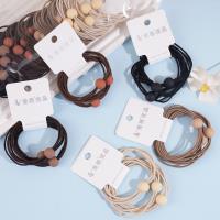 3 pieces of dried shrimp, ground into powder, with bead-headed rope and rubber bands