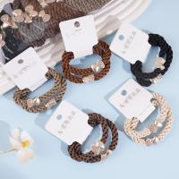 2 hollow elastic bands with semi-drilled bead heads and a string of beads on each end