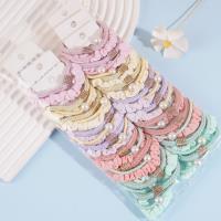 A set of three square braids with rectangular diamonds, combined with colorful headbands and rubber bands