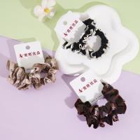 2 pieces of milk coffee-colored letter-edged small intestine head ropes and rubber bands