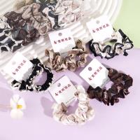 2 pieces of milk coffee-colored letter-edged small intestine head ropes and rubber bands