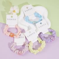 Colored beads, colorful small intestine tassels, and rubber bands