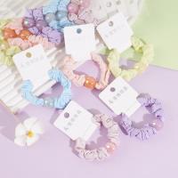 Colored beads, colorful small intestine tassels, and rubber bands