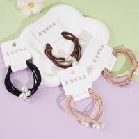 2 pieces of elastic bands with a round head and a string of pearls of different sizes