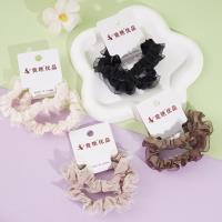 2 من الأشرطة المطاطية ذات حلقات صغيرة للأمعاء وحبل للربط.