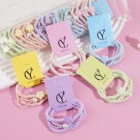 3 colorful star-shaped rubber bands for hair ties