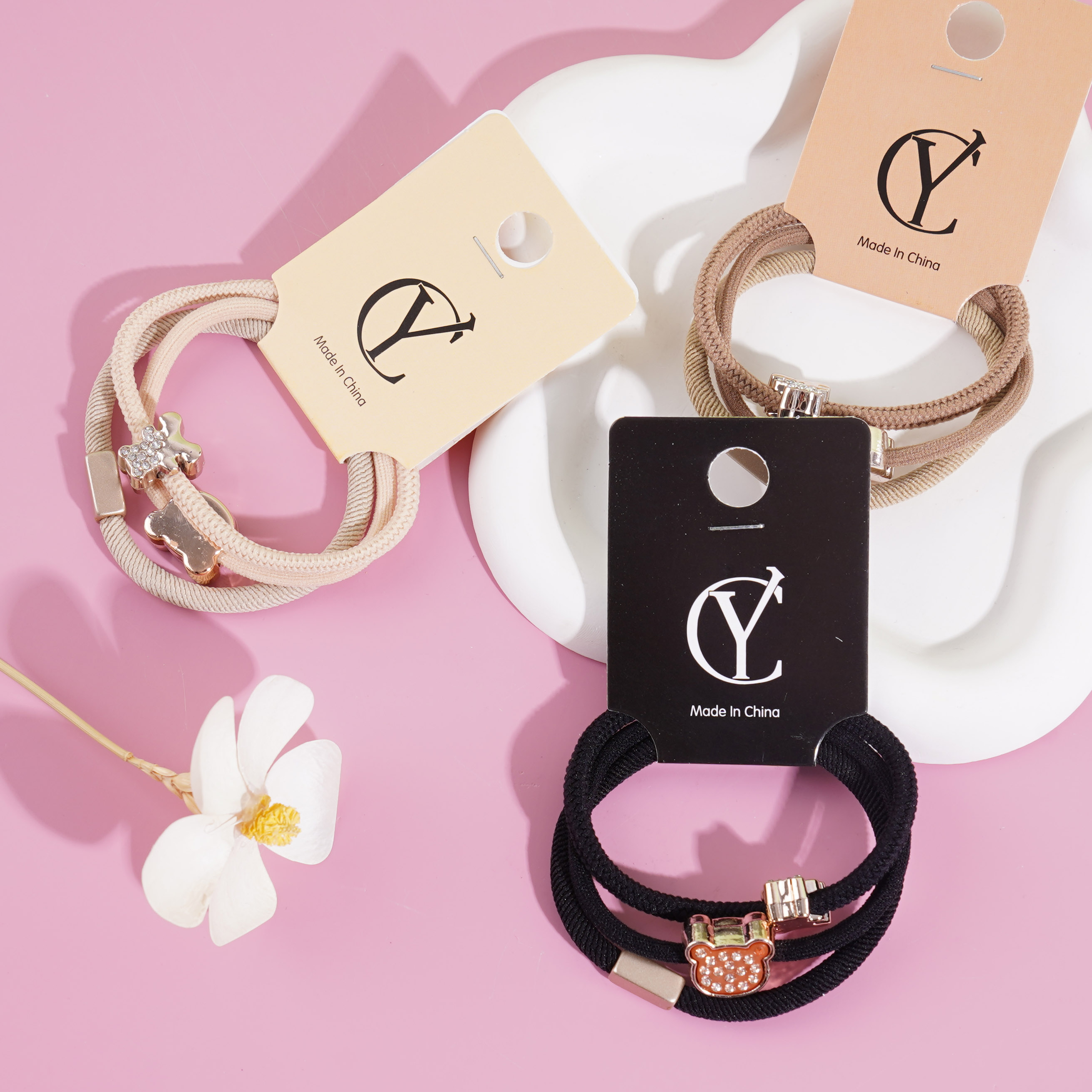 3 pieces of diamond-themed headbands and hair ties combined with bear-shaped motifs