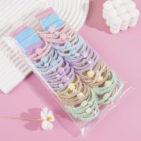 3 colorful flower-shaped headbands with elastic bands