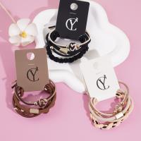 4 ball-shaped knotted headbands with elastic bands