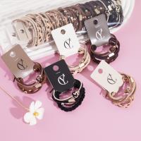 4 ball-shaped knotted headbands with elastic bands