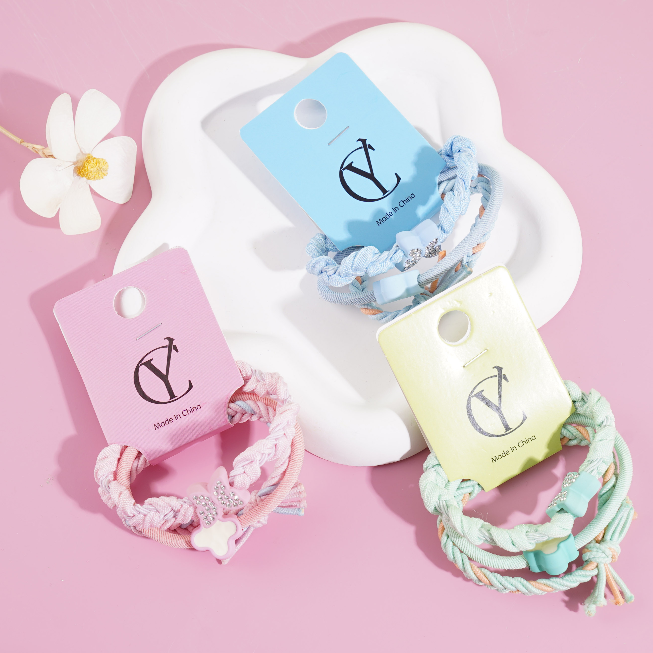 3 colorful butterfly-themed headbands with elastic bands