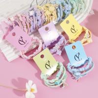 3 colorful butterfly-themed headbands with elastic bands