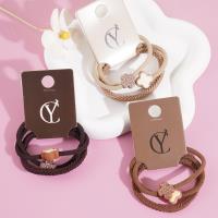 3 sets of four-leaf clover-themed headbands and hair ties