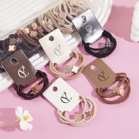 3 sets of four-leaf clover-themed headbands and hair ties