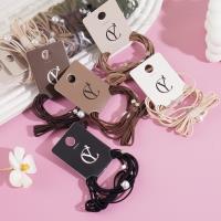 A set of three large pearl bow headbands with elastic bands