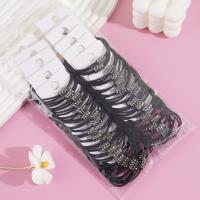 2 black diamond-themed headbands with elastic bands