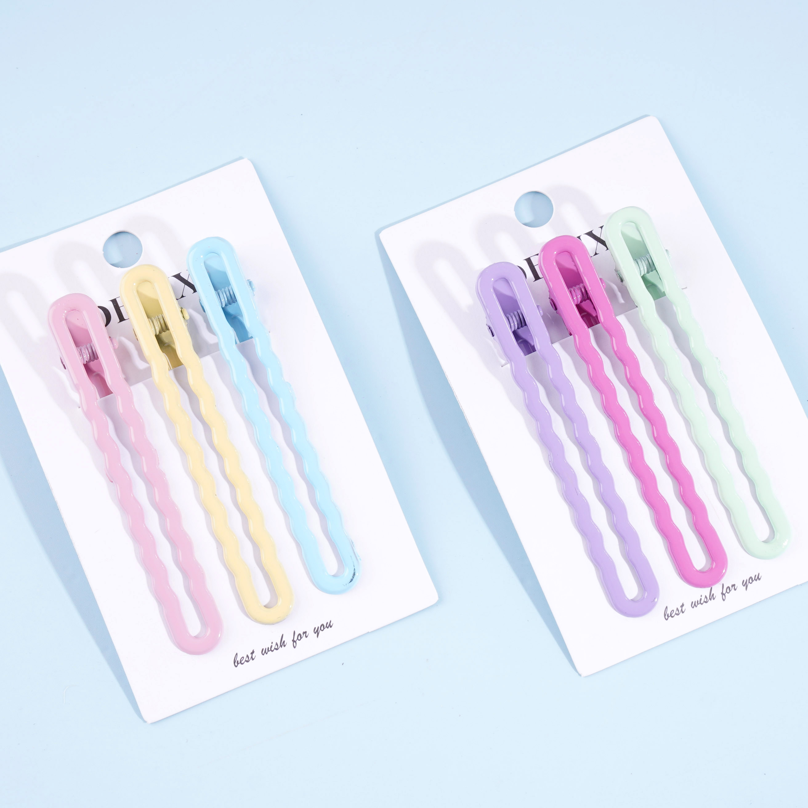 Three long clips for spray paint, duck clips, and BB clips