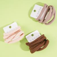 5 Ghent A towel rings with a coffee-colored headband and rubber bands