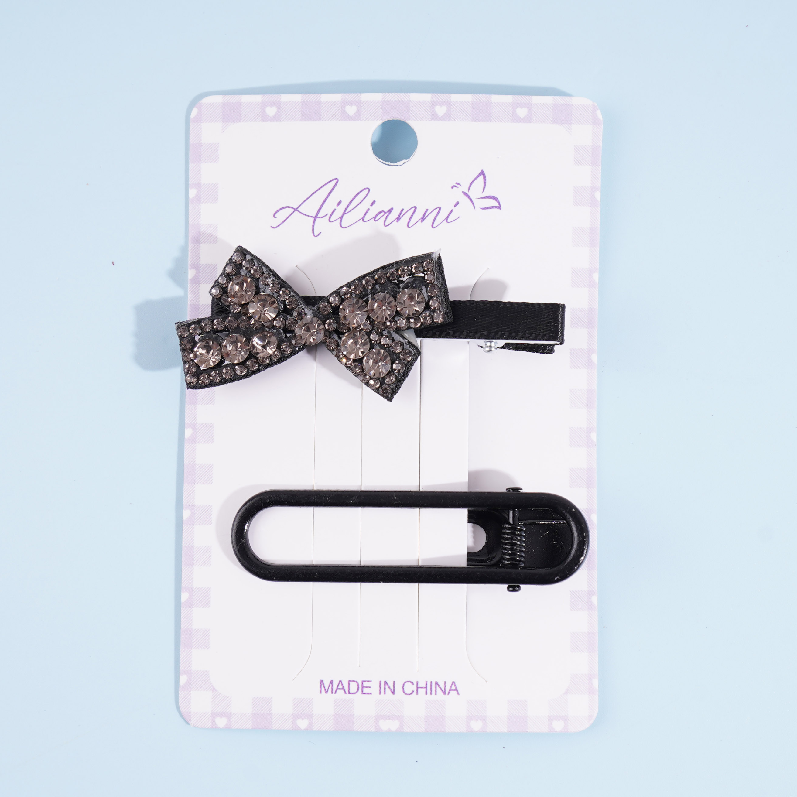 Black diamond bow tie with round duck clip and BB clip