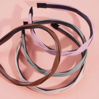 Colored headbands and hair clips with a pretzel-shaped design