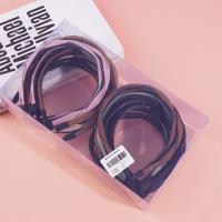 Colored headbands and hair clips with a pretzel-shaped design