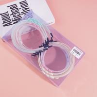 Three heart-shaped children's headbands with hair clips