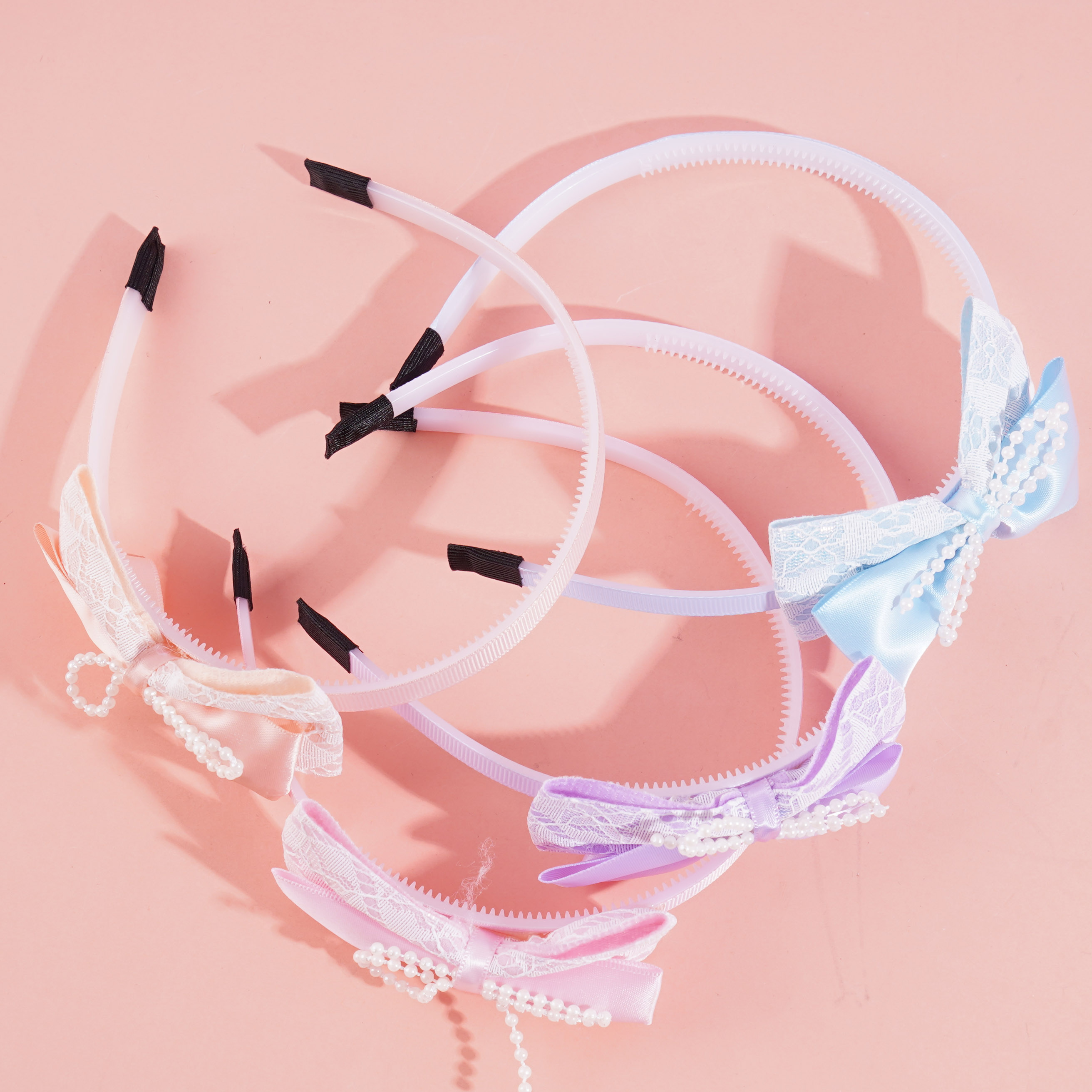 Children's headband with a ruffled bow decoration