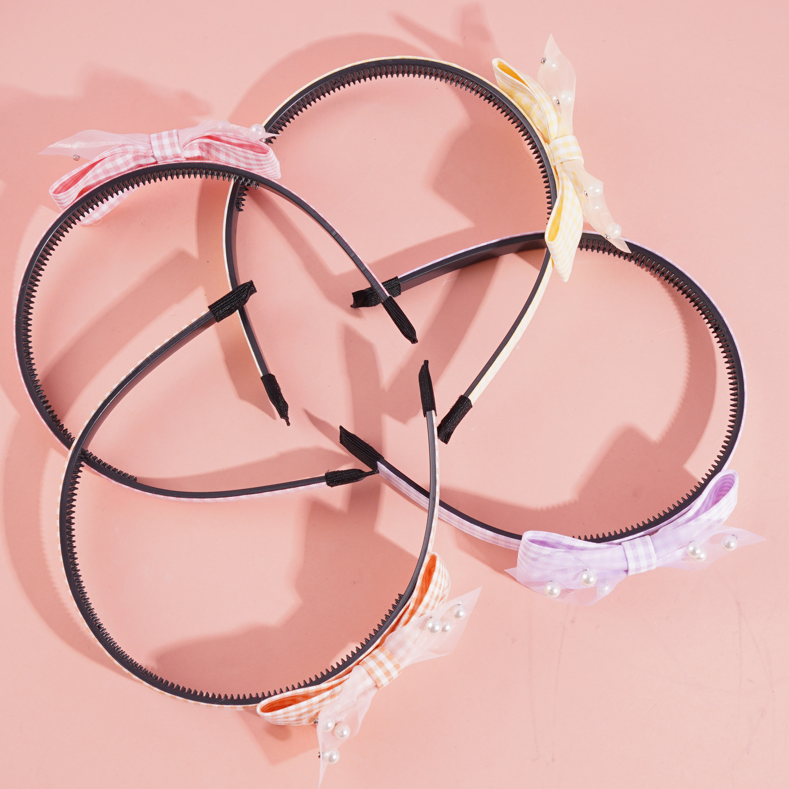 A headband with six pearls for children