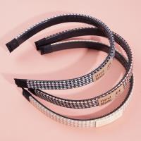 A headband with a thousand-bird pattern and a bow-shaped buckle