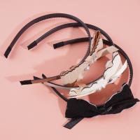 Black-edged diamond bow tie headband hair clip