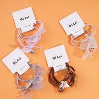 2 flower-shaped silver bead headbands with elastic bands