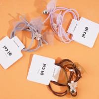 2 flower-shaped silver bead headbands with elastic bands