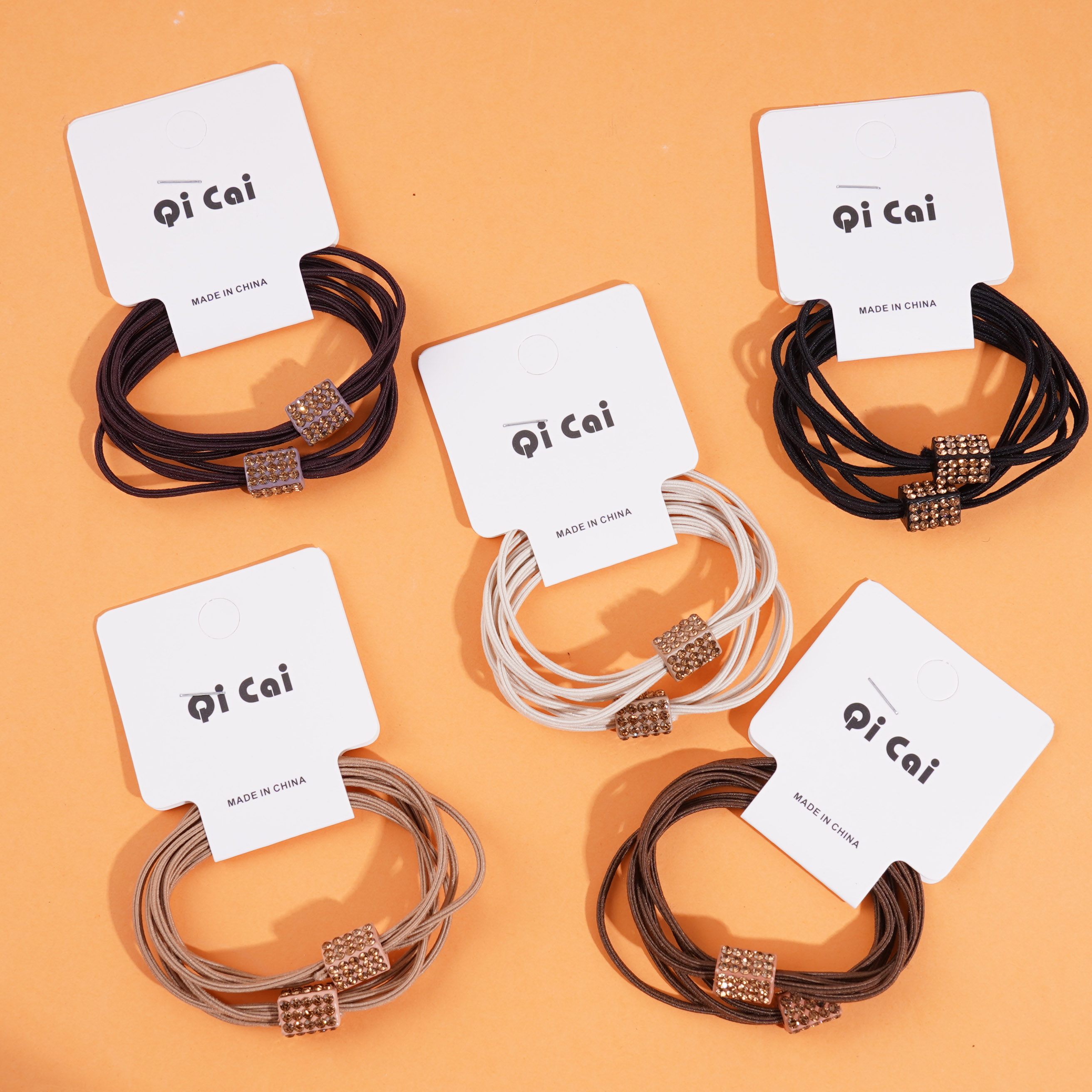 2 square sugar headbands and rubber bands