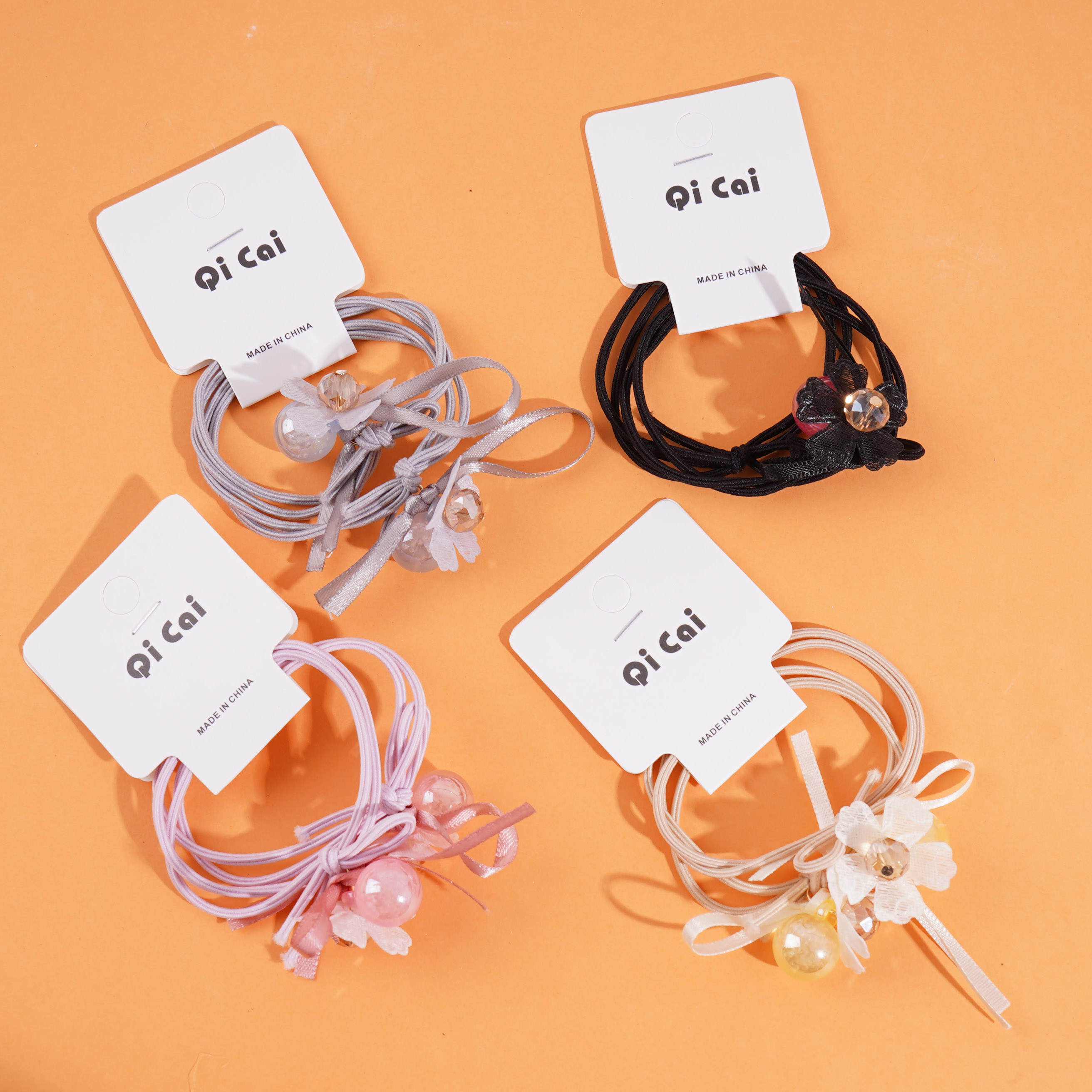 2 colorful bead flower headbands with elastic bands