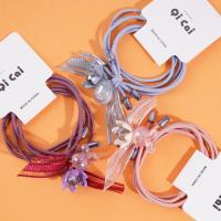 2 colorful bead butterfly-shaped headbands and rubber bands