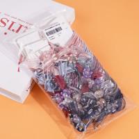 2 colorful bead butterfly-shaped headbands and rubber bands