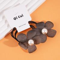 2 flower-shaped sponge headbands with elastic bands