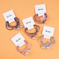 2 élastiques à tête en cristal