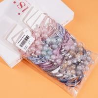 2 élastiques à tête en cristal