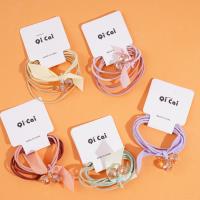 2 round pearl white ribbon headbands with elastic bands