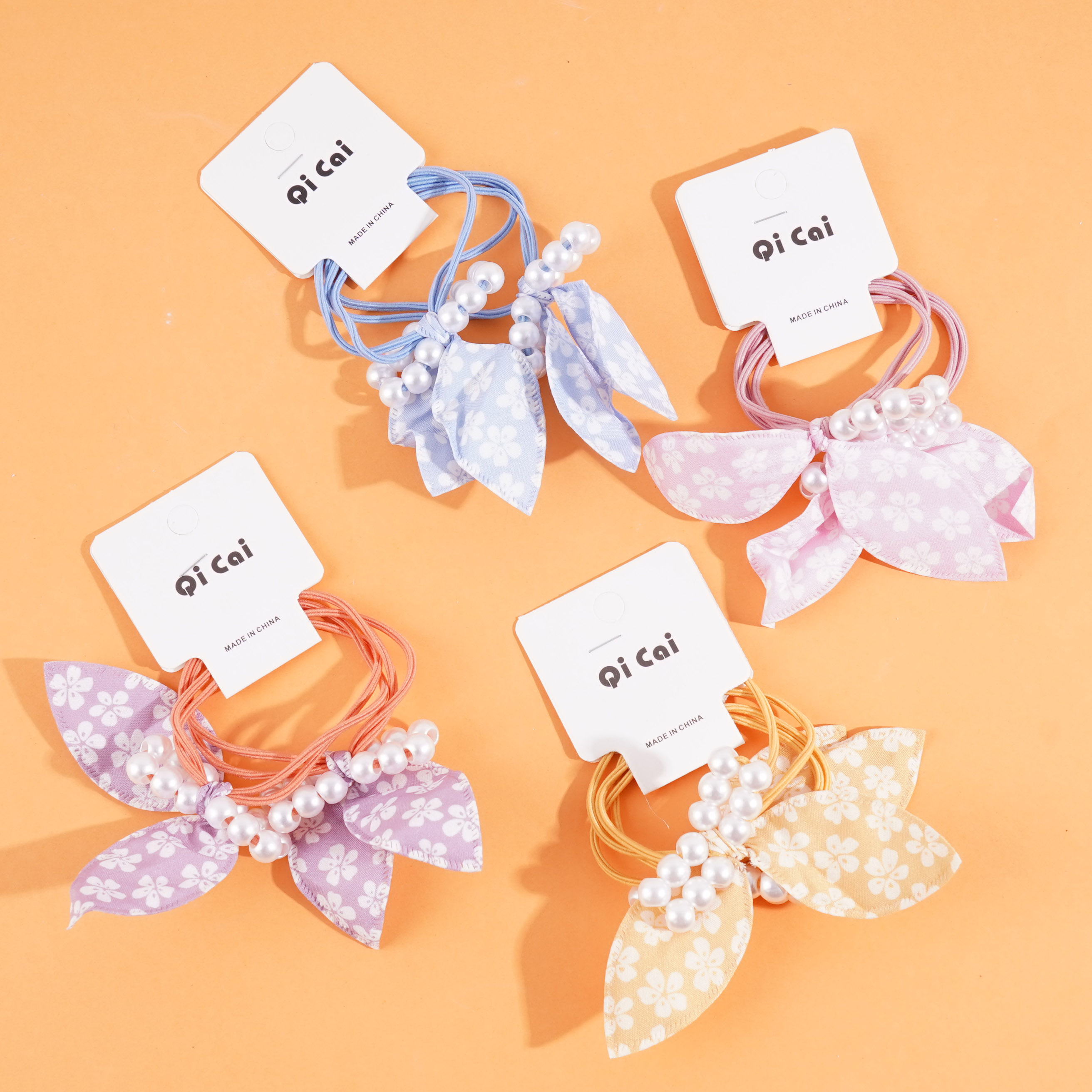 2 pieces of headbands with pearl floral bows and elastic bands