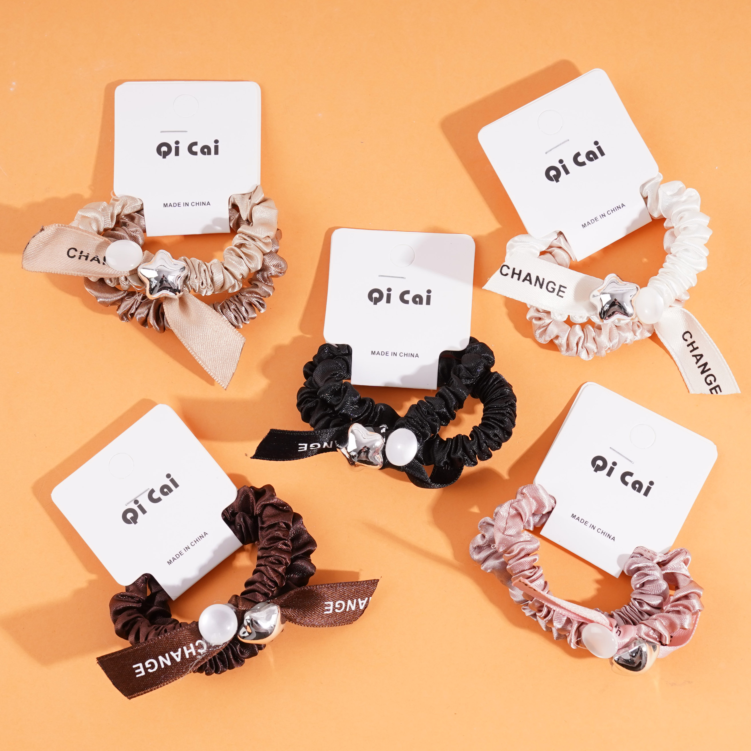 2 pieces of five-star letter-shaped rubber bands with looped ends for tying things together