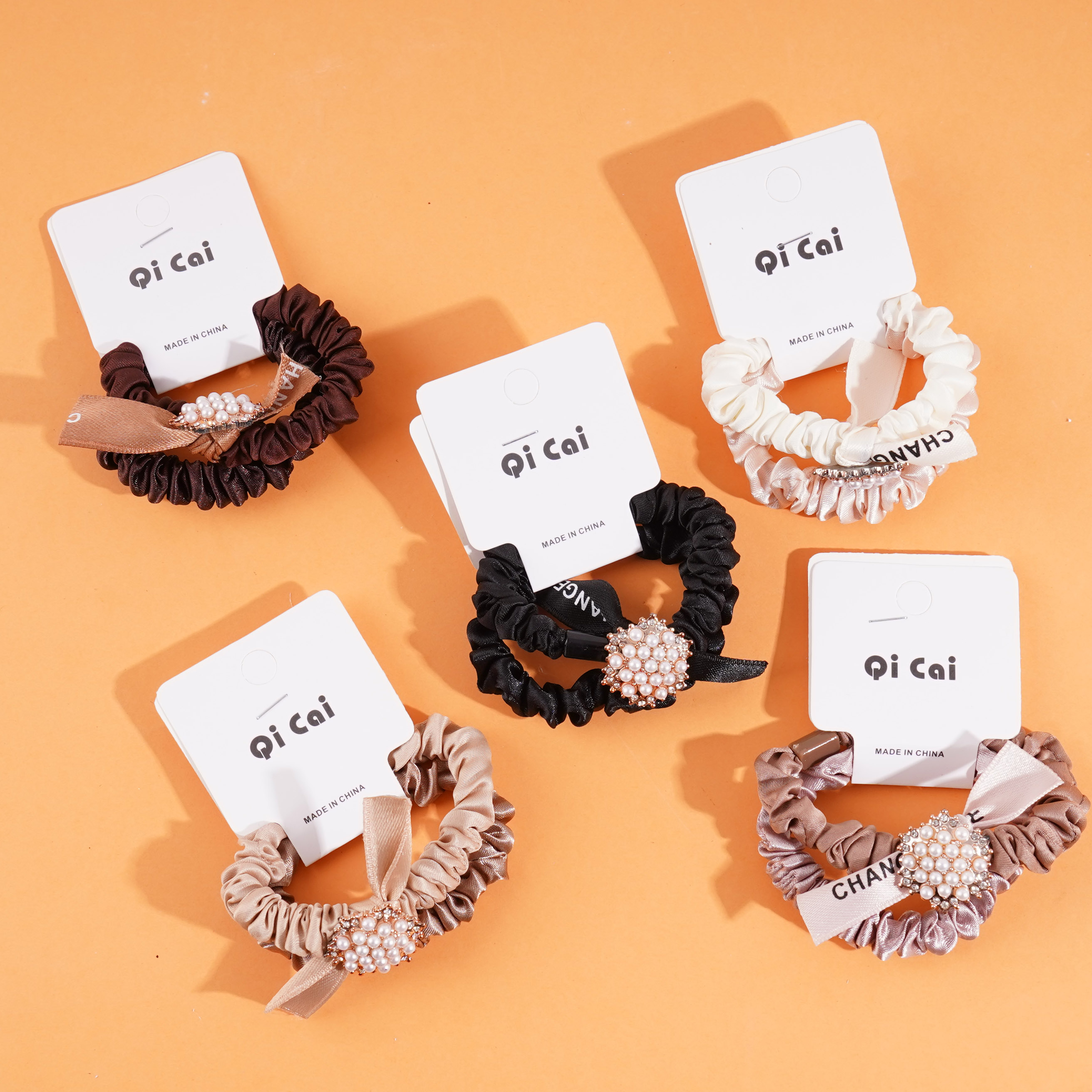 2 pieces of five-star pearl sausage with a looped head rope and rubber bands