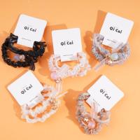 2 colorful bead ribbons with a hoop-shaped belt and a rubber band for tying hair