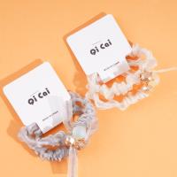 2 colorful bead ribbons with a hoop-shaped belt and a rubber band for tying hair